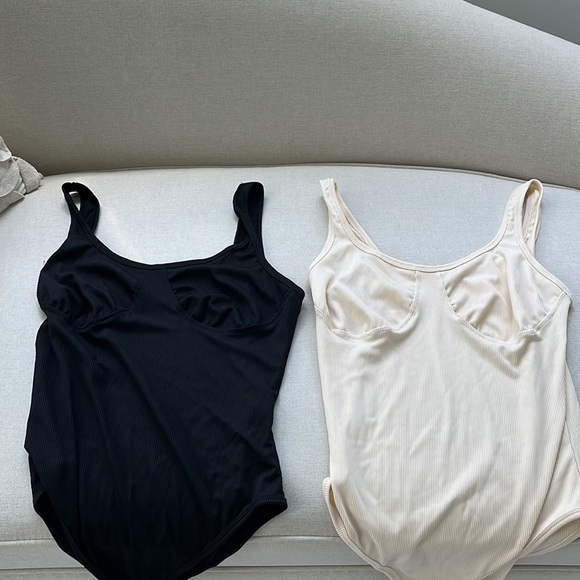 2 size medium bodysuits black and ivory never worn. Price for both bodysuits.NWT - Picture 2 of 4